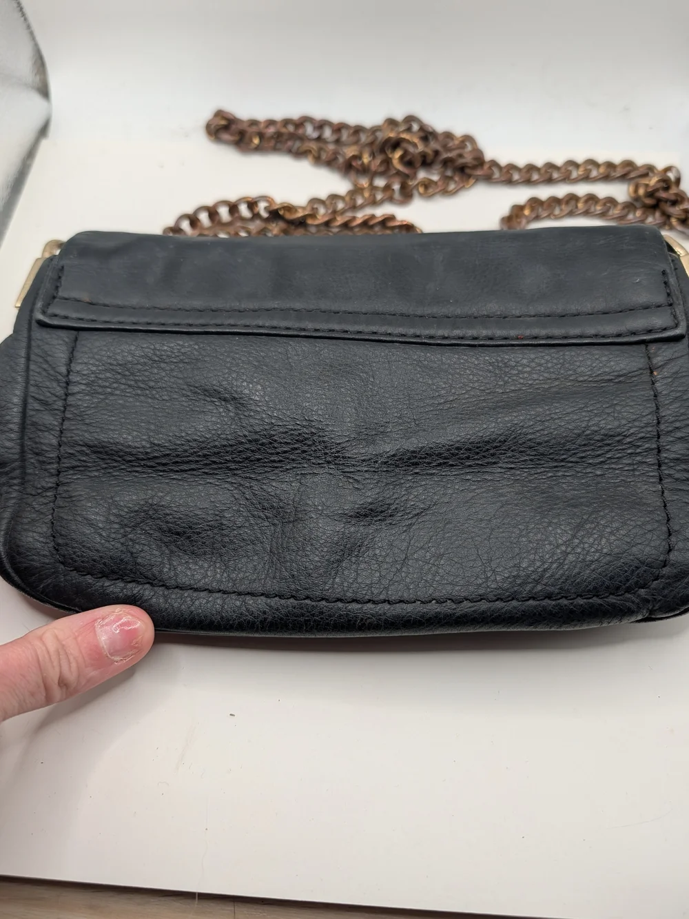 kate spade black leather crossbody with bronze chain